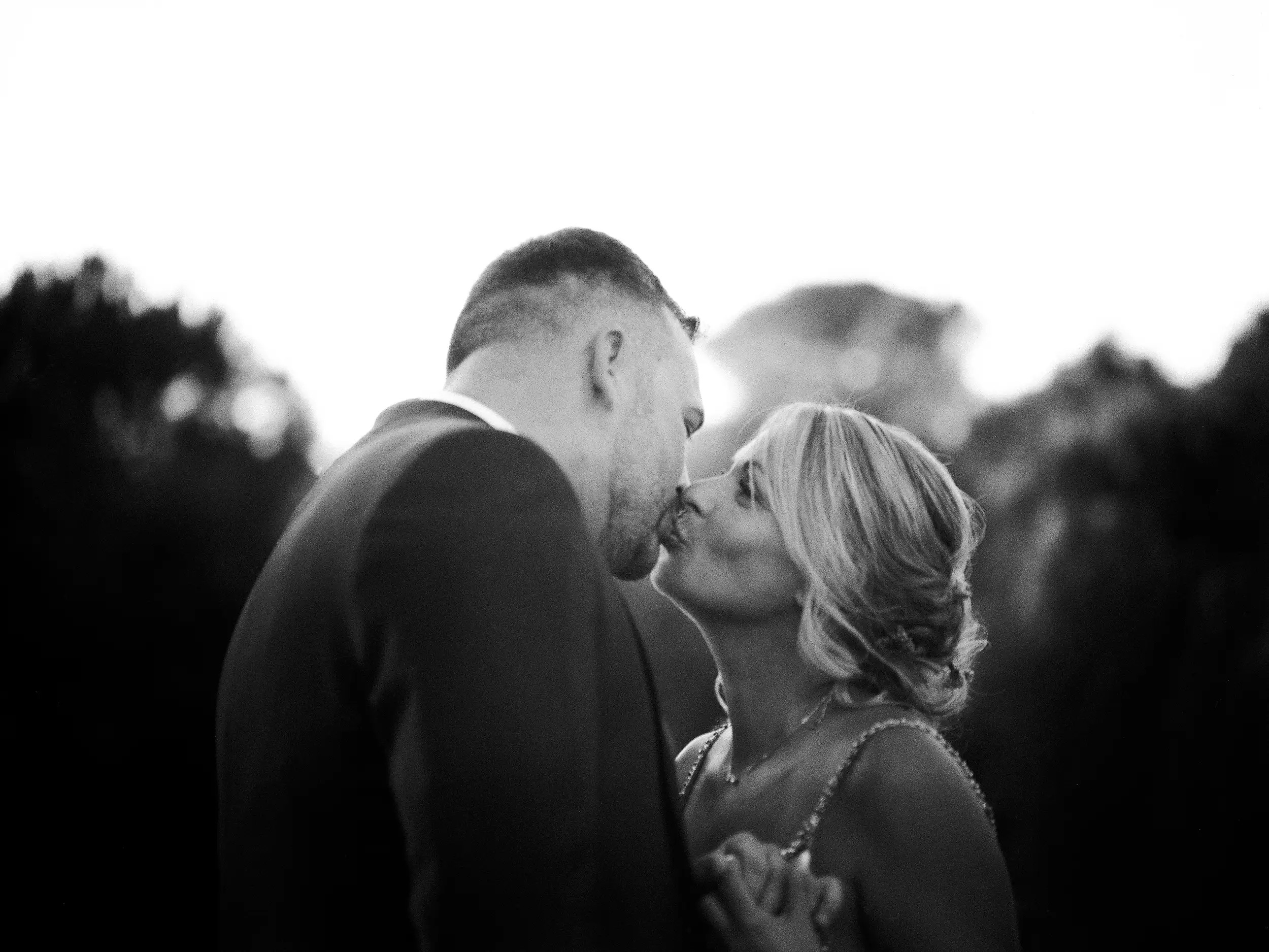 Barcelona Wedding Photographer - Artistic photograph of couple kissing in black and white