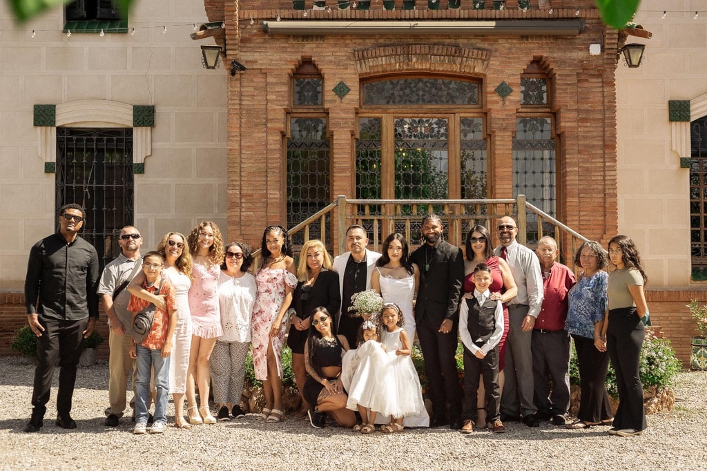 Family and friends in front of the Can Borrell façade after the ceremony